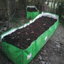 HDPE biofertilizer grow-bed with composted organic matter